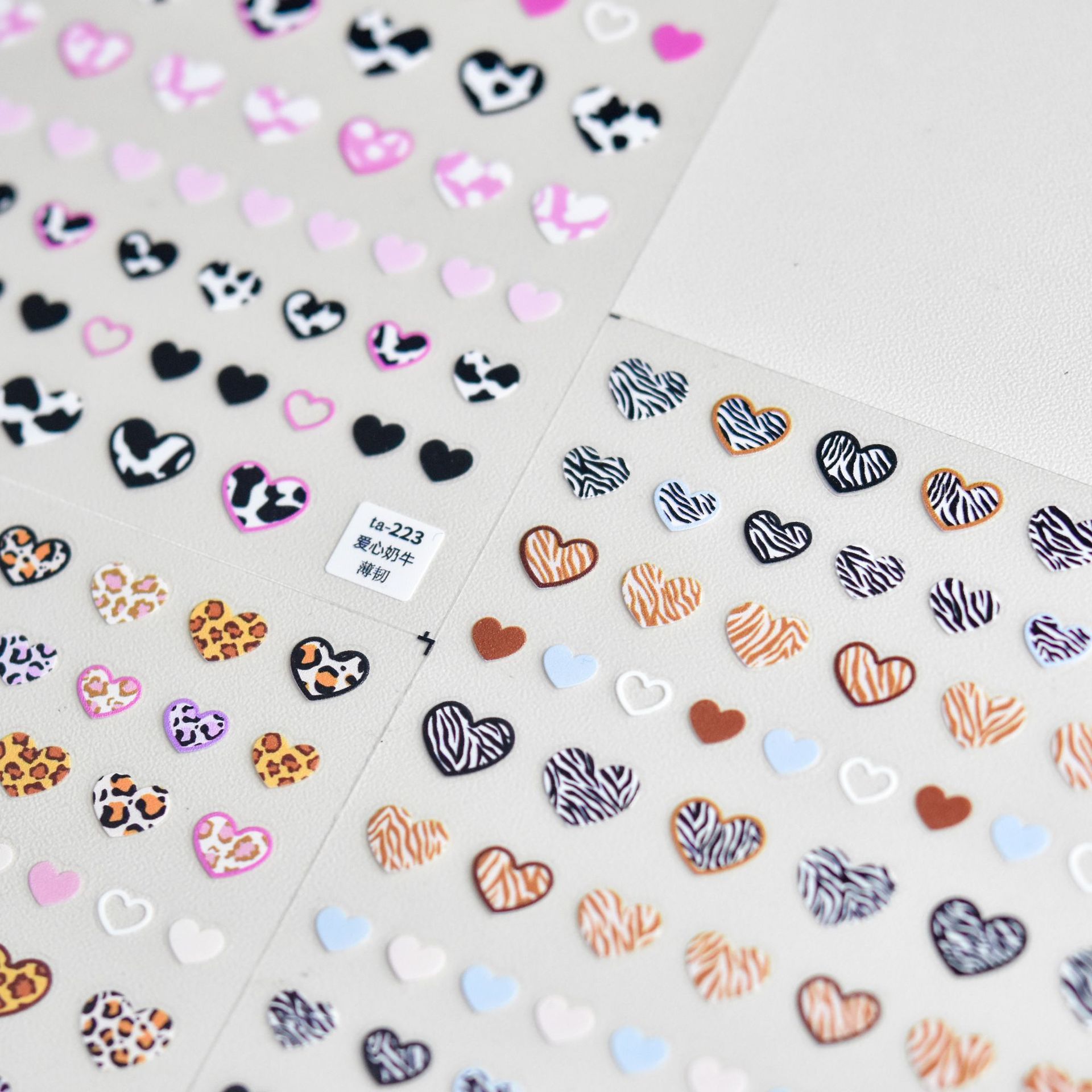 パターン化された愛の心を持つ動物のステッカー,高品質の弓,ヒ - Nail Art Zebra Design のレビューと価格